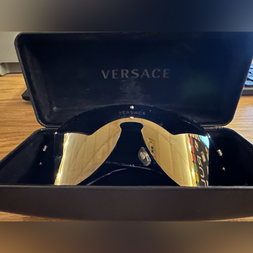 Versace sunglasses. Worn one weekend on vacation.